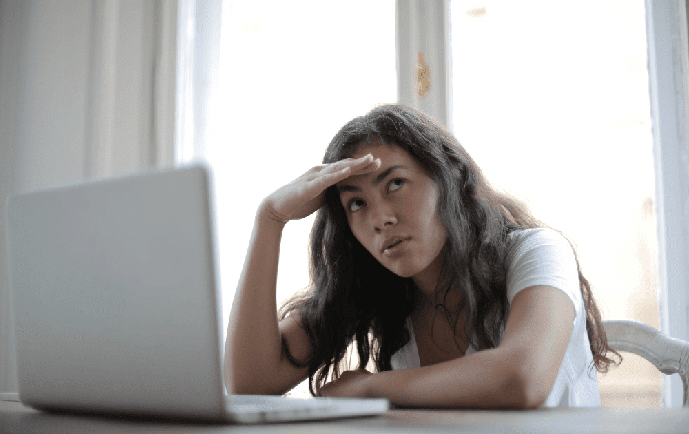 A distracted girl with laptop