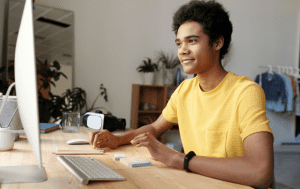 Male watching desktop screen