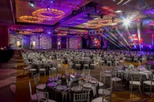 Awards dinner silver table and centerpiece design purple and red lighting 2 2048x1365 1