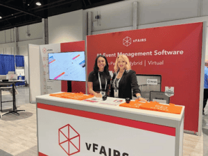 vFairs in person event booth with their branded merchendise