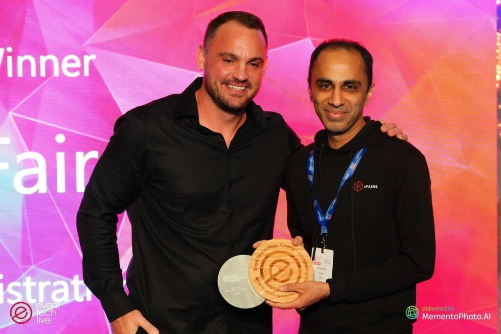 Younas winning award at event tech live